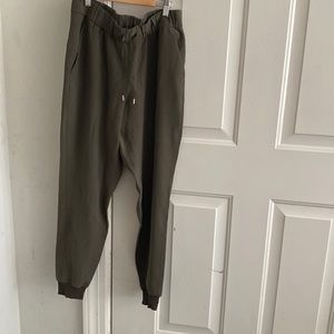 Lululemon “On the Fly” mid-rise jogger. Size 6. Color: Dark olive